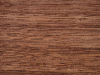 Bubinga veneer with distinctive wave patterns and warm reddish hues