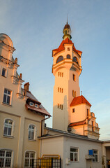 Fototapeta premium Sopot lighthouse next to pier in Sopot, Poland