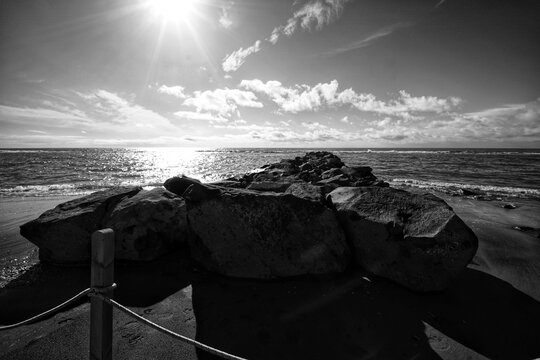 View of some boulders used for beach nourishment, often referred to as cyclopean or category II natural boulders, they are large rocks used for coastal defense works.