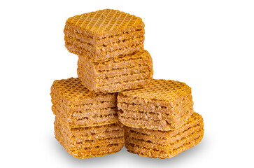 Stack of wafer filled with salted caramel flavored cream isolated on white background.
