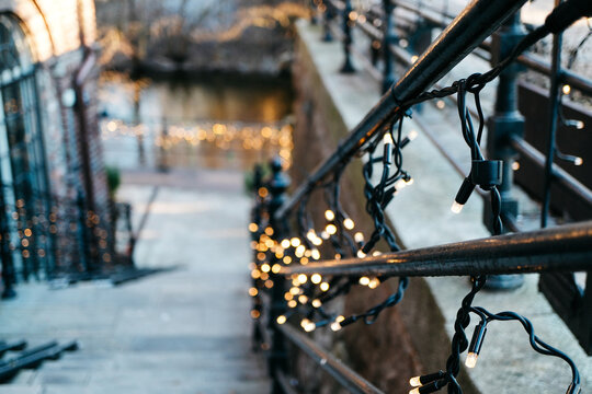 Charming Walkway Adorned with Twinkling Fairy Lights Offering a Magical Outdoor Ambiance on Picturesque Evening Staircase