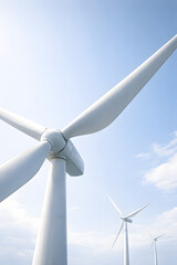 Close-up of Modern Wind Turbine Blades Generating Clean Renewable Energy Against Blue Sky