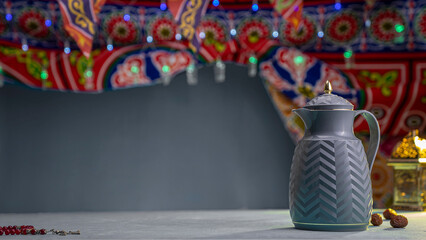 Modern White Arabic Coffee Thermos on Festive Ramadan Khayamiya Background with Bokeh Lights.
