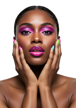 young black woman, mid-20s, bold multi-colored makeup (pink, blue, purple eyeshadow, glossy pink lips) & vibrant nails. hands frame face on white studio background. high fashion beauty concept