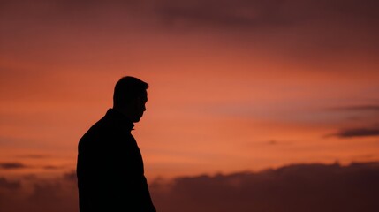 Fototapeta premium backlight. Male silhouette against a vibrant sunrise sky with dramatic backlighting. travel magazines, destination branding, designed for travel destination branding, used by devops engineers. 
