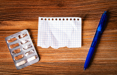 Blank Paper with Pen and Pills