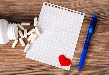 Blank Paper with a Pills and Heart