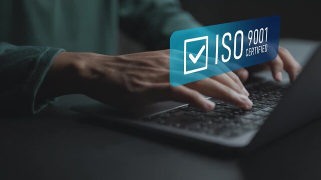 ISO 9001 quality assurance and certification concept with digital tools. Professional managing audits, procedures and quality standards via a laptop interface.