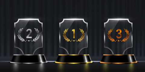 Glossy glass awards for 1st, 2nd, and 3rd place on a dark background.