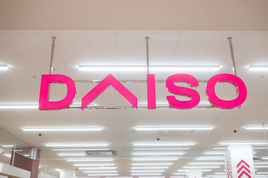 Ceiling-Mounted DAISO Logo at Storefront Entrance