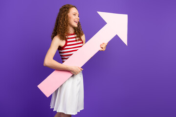 Rise with a pink arrow as a young woman smiles against a purple background highlighting fashion style growth confidence modern lifestyle concepts