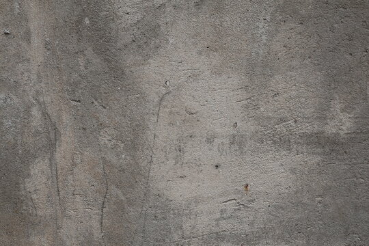 Freshly cast concrete wall with rough surface