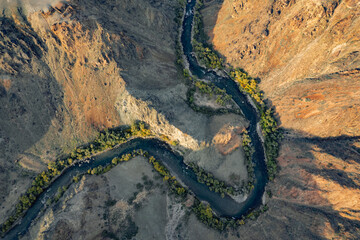 View from the top on the winding river flows through the Black canyon 