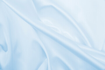 Fototapeta premium Smooth elegant blue silk or satin luxury cloth texture as abstract background. Luxurious background design