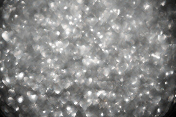 Silver heart bokeh background with soft sparkling light
