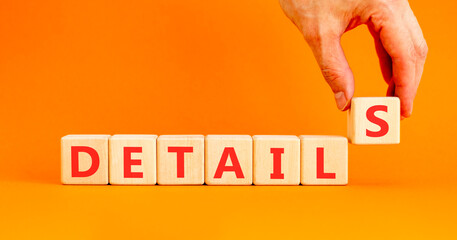 Details detail symbol. Concept word Details on beautiful wooden blocks. Beautiful orange...