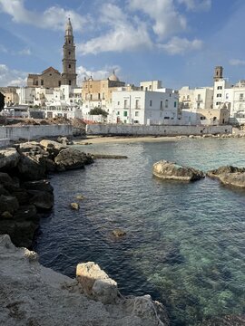 View across the harbour of Traditional whitewashed houses in the old town, Monopoli, Bari, Puglia, Italy