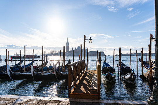 Rows of gondolas in a Venetian Lagoon on a winter morning, Venice, Veneto, Italy