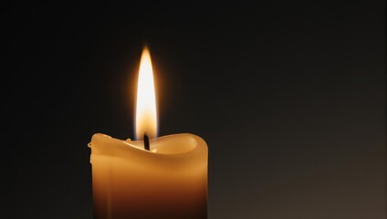 Warm Candlelight Illuminating Darkness - A Symbol of Hope and Remembrance.