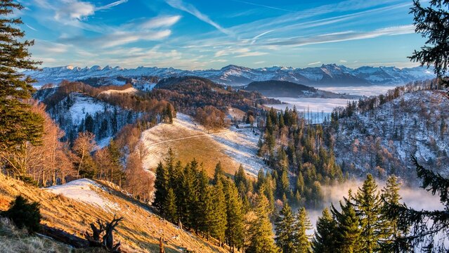 Sunset over the mist on the Schnebelhorn. Fantastic view from the highest point in the canton of Zurich. High quality photo. High quality photo