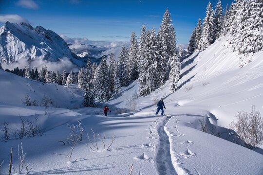 Ski tour to the Lachenstock mountain above Lake W&auml;gital. Fantastic skitour in the snow-covered mountains with breathtaking views. Skimo near the Mountain Mutteristock. Swiss Alps. High quality photo