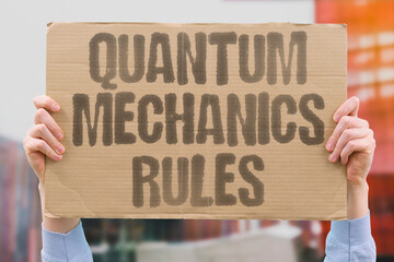 "Quantum Mechanics Rules" Subatomic laws govern reality. QUANTUM. MECHANICS. RULES. SUBATOMIC. LAWS.