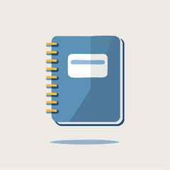 A blue notebook with yellow rings and a white label on a plain surface viewed from directly above