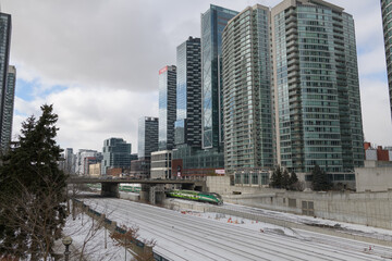 Naklejka premium King West Village, or the multi-unit, mixed-use complex with The Well, a shopping mall, facing Front St W (between Bathurst and Spadina), viewed from Iceboat Terrace, Toronto
