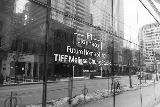 black and white view of sign at TIFF Lightbox (Melissa Chung Studio coming soon) at 350 King St W, Toronto
