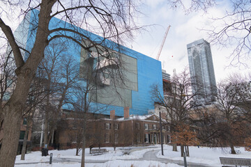 Naklejka premium winter in Grange Park, and a view of Frank Gehry's Blue Box, historic Grange house, in Toronto