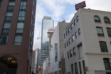 Naklejka premium looking east on Pearl St to the Mirvish complex of buildings (Princess of Wales Theatre), from John St, Toronto