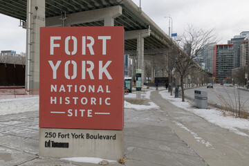 Naklejka premium looking east on Fort York Blvd near Fort York National Historic Site, 250 Fort York Blvd, site of The Bentway beneath the elevated Gardiner Expressway, Toronto