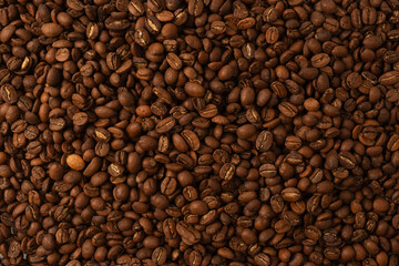 Fototapeta premium Coffee beans on a white background. Coffee beans texture.