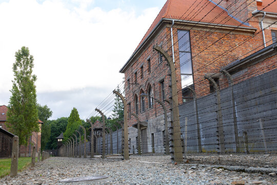 AUSCHWITZ, POLAND - SEPT 27, 2017: Auschwitz Holocaust Memorial Museum. The main gate of concentration camp with inscription: arbeit macht frei - work makes you free