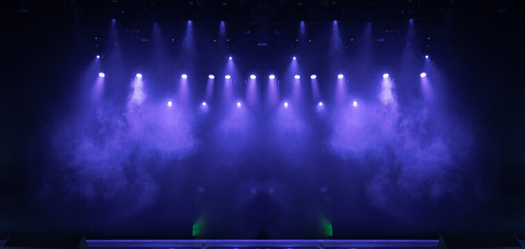 scene, stage light with colored spotlights and smoke