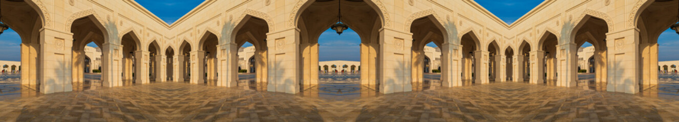 Eastern architecture, ancient-style buildings, domes and round roofs, arches and columns. On the streets of the Emirates, in public places.