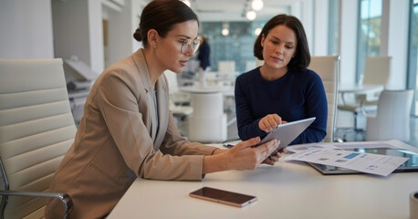 Fototapeta premium Paperwork, tablet and business people in office with discussion for finance report for budget planning. Collaboration, digital technology and manager with financial advisor for investment deal review