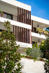 Fototapeta premium Building exterior with plants on the facade
