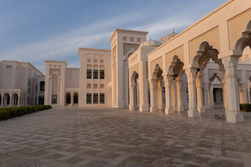 Fototapeta premium Elements of architecture of buildings, ancient arches, columns, windows and apertures. On the streets in Emirates, public places.