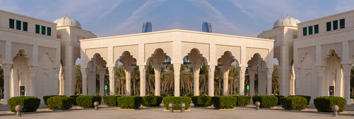 Naklejka premium Eastern architecture, ancient-style buildings, domes and round roofs, arches and columns. On the streets of the Emirates, in public places.