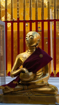 Golden Upagutta or Upagupta at Wat Phra That Doi Suthep, Chiang Mai, northern Thailand. Statue of monk , Buddhist.