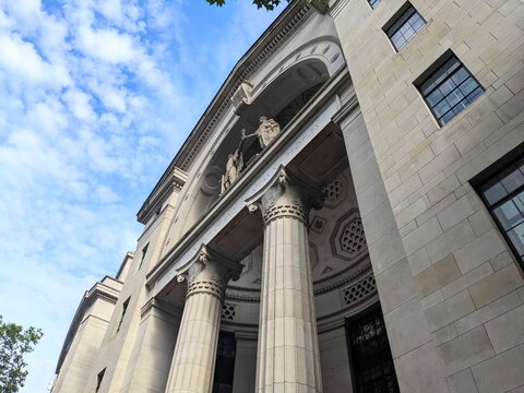 Grand Neoclassical Architecture of Bush House in London Under a Bright Summer Sky