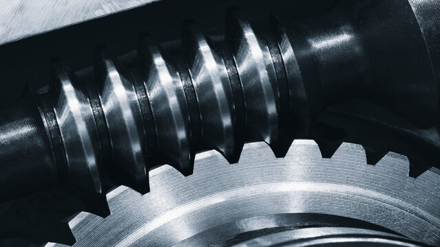 Bronze and metal worm gear close-up, industrial precision concept
