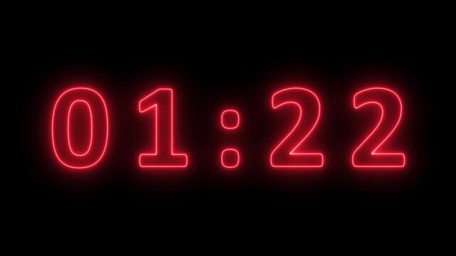 Striking neon red digital clock displaying the time 01:25 with a bright luminous glow against a dark black background