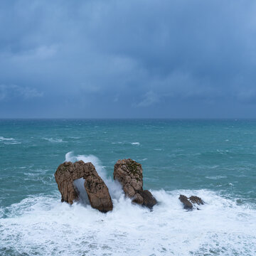 Storm and waves at "Urro del Manzano," also known as "Gateway to the Cantabrian Sea." Cantabrian Sea. Liencres Natural Park in the Costa Quebrada Geopark. Liencres, Cantabria, Spain, Europe