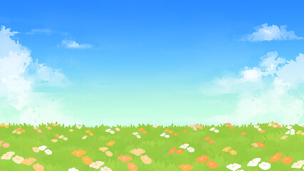 花が咲く草原と青空の背景