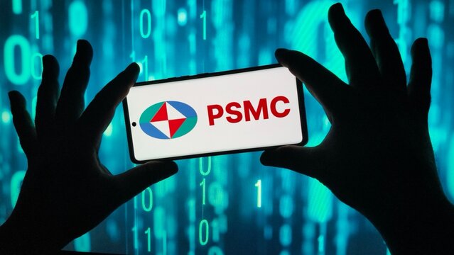 Hands holding smartphone displaying the psmc logo on binary background