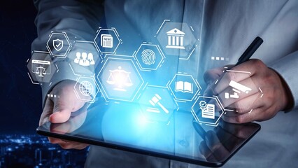 Fototapeta premium Digital Transformation in Legal Sector, Hands Holding Tablet with Technology Icons Representing Law, Justice, and Online Services Gluon.