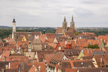 Fototapeta premium Panoramic view of Rothenburg ob der Tauber old town, Bavaria, Germany, seen from the historic Röderturm tower on the medieval city wall, charming travel destination.