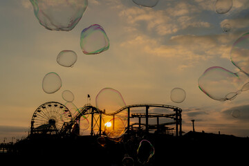 Sunset Magic: Bubbles Dance Over California Pier